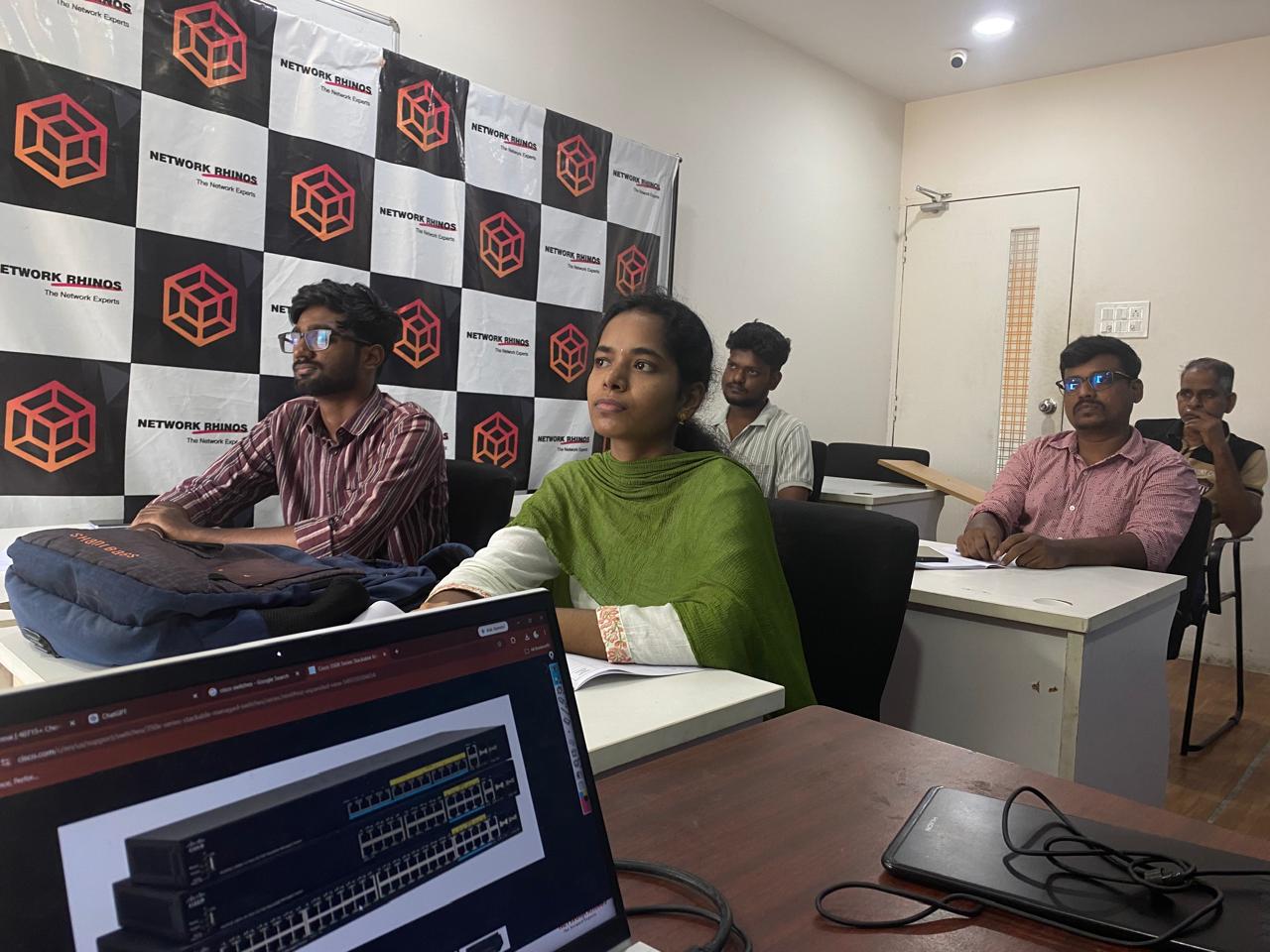 Network Rhinos classroom batch — August 2026 students learning with Cisco lab equipment