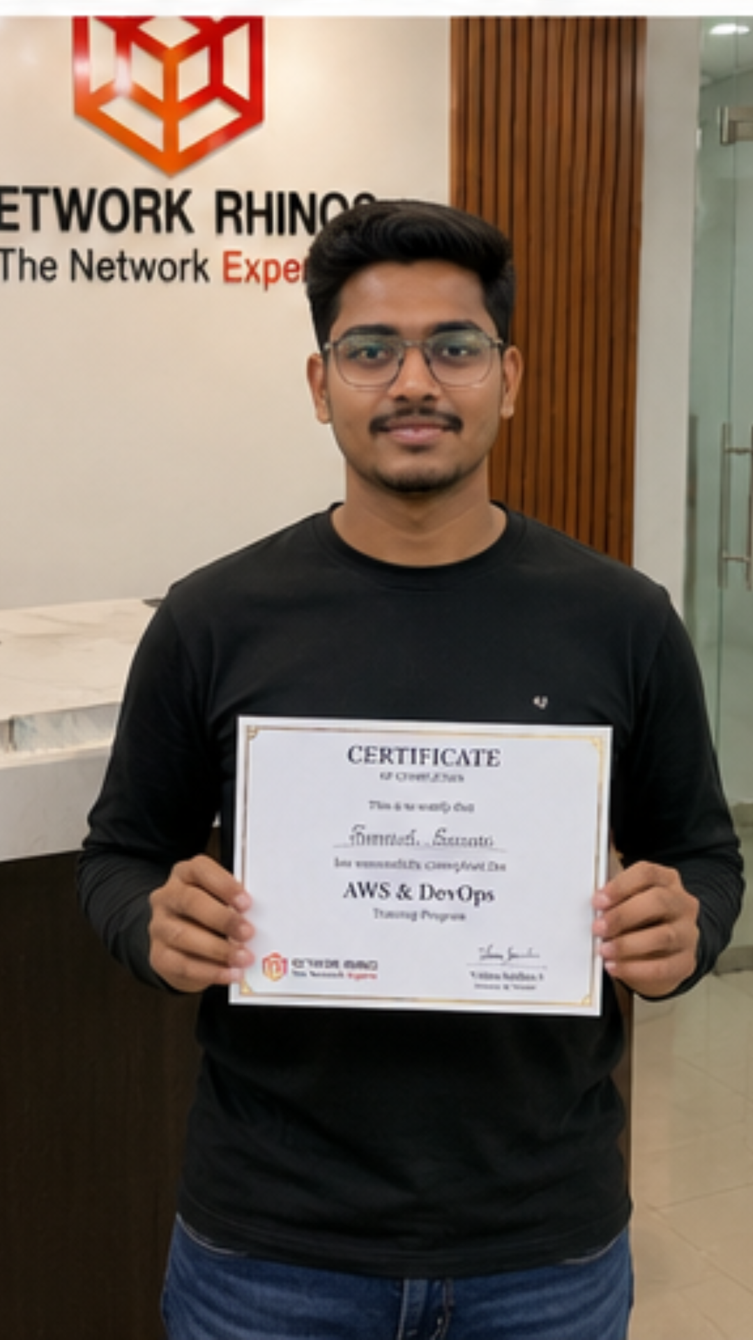Network Rhinos student with AWS & DevOps course completion certificate